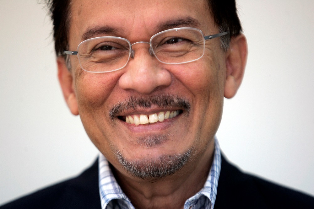 Datuk Seri Anwar Ibrahim speaks to Reuters at his office in Petaling Jaya August 4, 2008.u00e2u20acu201d Reuters pic