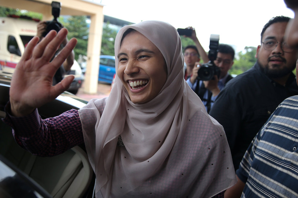 Nurul Izzah Anwar smiles as she leaves at the Cheras Rehabilitation Centre hospital in Kuala Lumpur May 11, 2018. u00e2u20acu201d Reuters pic