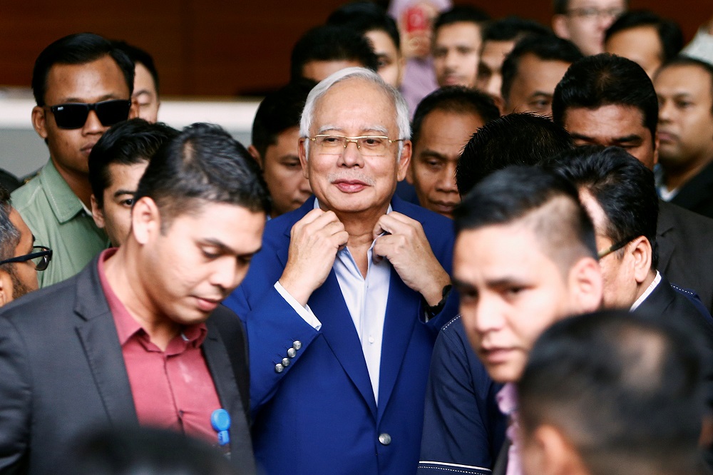 Former prime minister Datuk Seri Najib Razak leaves after giving a statement to the Malaysian Anti-Corruption Commission in Putrajaya May 22, 2018. u00e2u20acu201d Reuters pic