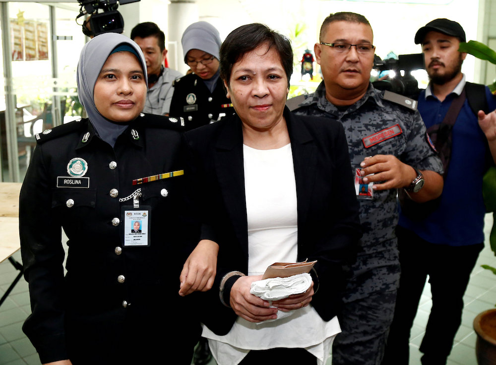 Australian Maria Elvira Pinto Exposto leaves following her release at the High Court in Shah Alam December 27, 2017. u00e2u20acu201d Reuters pic