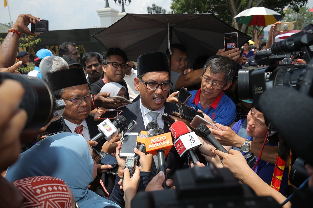 Perak Pakatan Harapan chairman Ahmad Faizal Azum speaks to the press outside the Istana Kinta in Ipoh May 12, 2018. u00e2u20acu201d Picture by Marcus Pheong