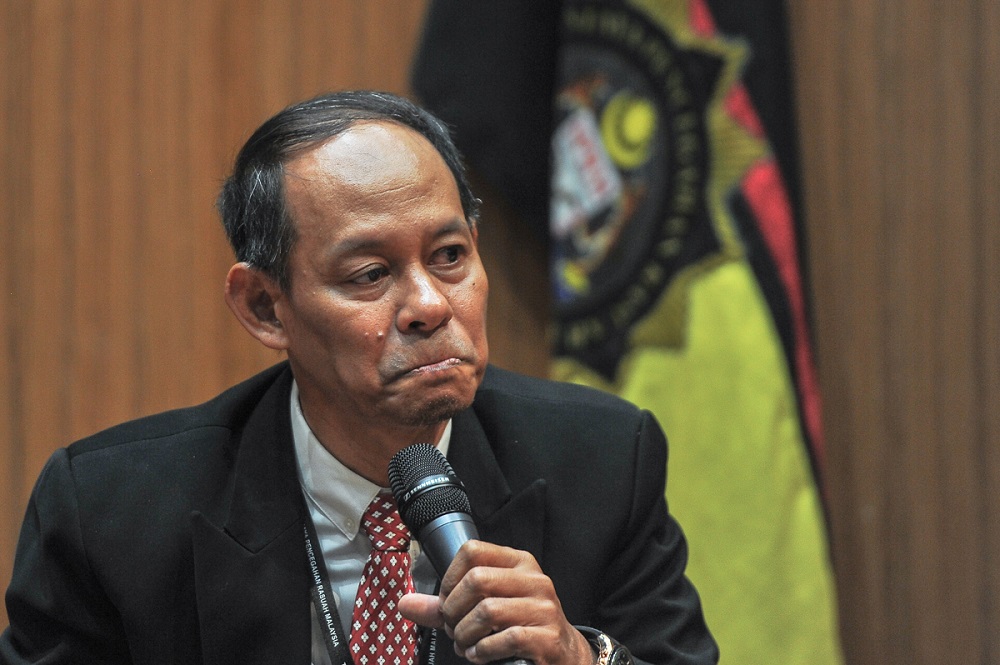 Malaysian Anti-Corruption Commission (MACC) chief commissioner Datuk Sri Mohd Shukri Abdull reacts during a press conference at the MACC headquarters in Putrajaya May 22, 2018. u00e2u20acu201d Picture by Shafwan Zaidon