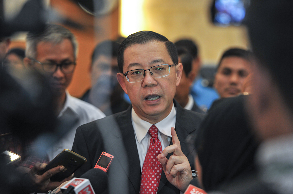 Finance Minister Lim Guan Eng speaks to the media in Putrajaya May 23, 2018. u00e2u20acu201d Picture by Shafwan Zaidon
