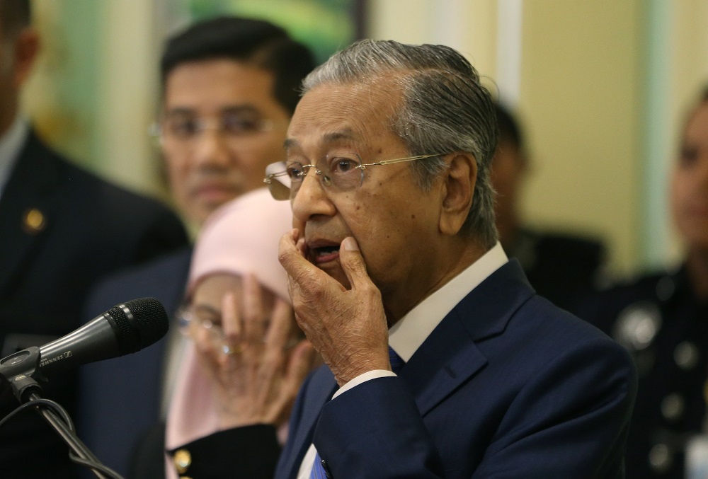 Prime Minister Tun Dr Mahathir Mohamad speaks during a press conference in Putrajaya May 23, 2018. u00e2u20acu201d Picture by Abdul Razak Ghazali
