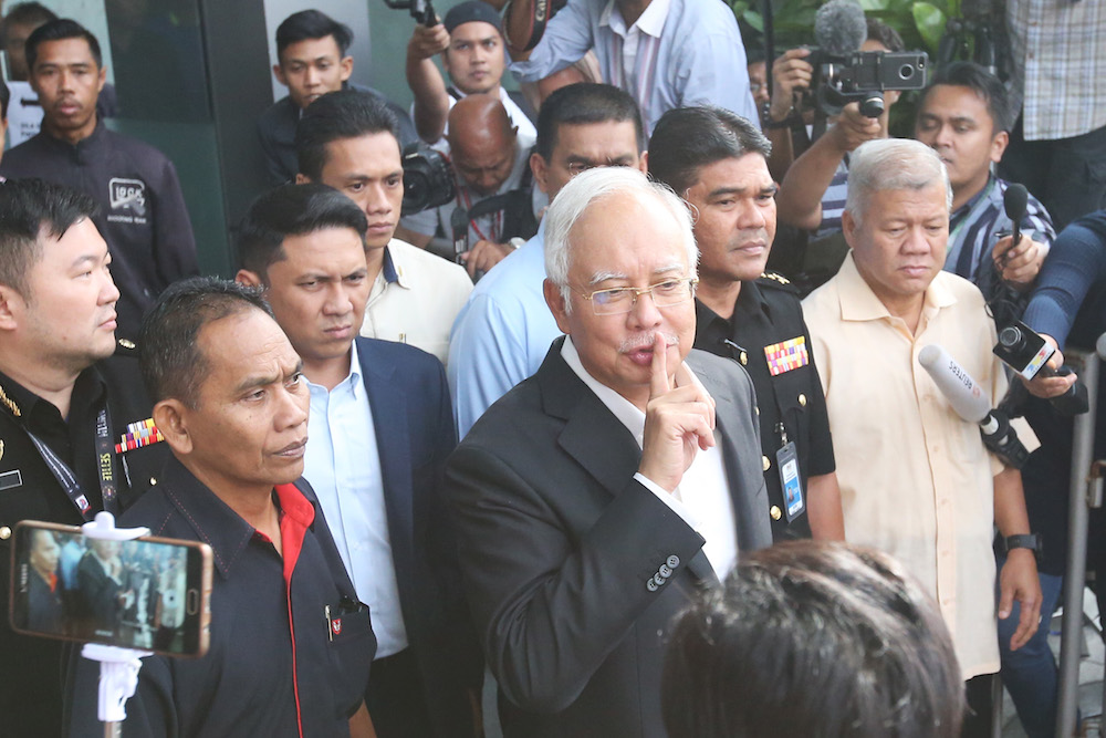 Datuk Seri Najib Razak leaves MACC headquarters in Putrajaya May 24, 2018. u00e2u20acu201d Picture by Azinuddin Ghazali
