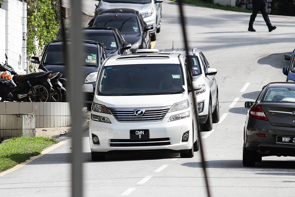 A white Toyata Vellfire is seen leaving Datuk Seri Najib Razaku00e2u20acu2122s residence in Jalan Langgak Duta in Kuala Lumpur May 25, 2018. u00e2u20acu201d Picture by Miera Zulyana 
