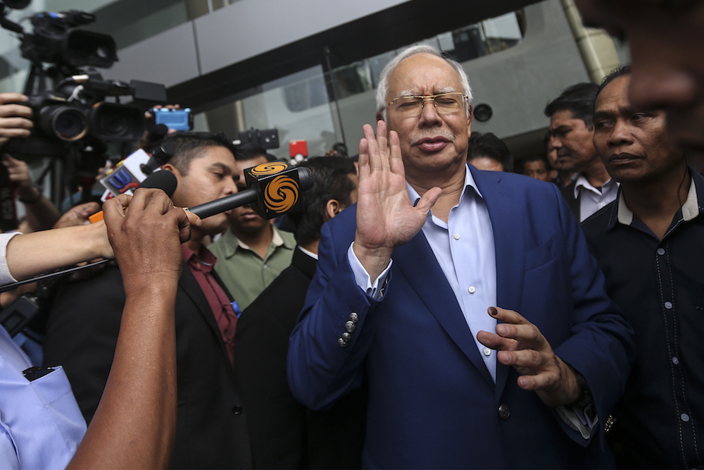 Former Prime Minister Datuk Seri Najib Razak reacts to questions by the media while leaving the MACC headquarters in Putrajaya May 22, 2018. u00e2u20acu201d Picture by Azneal Ishak