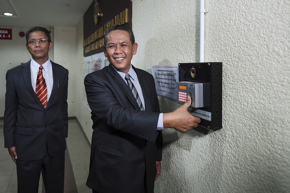 Aminuddin Harun clocks in for the first time as Negri Sembilan mentri besar at Wisma Negeri in Seremban May 14, 2018. u00e2u20acu201d Bernama pic
