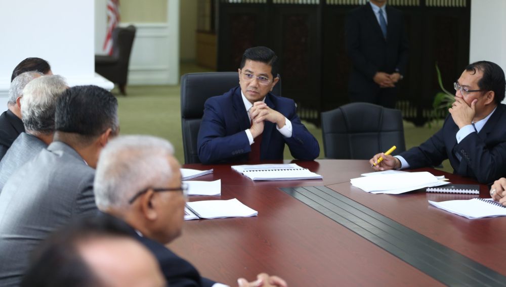 Minister of Economic Affairs Datuk Seri Mohamed Azmin Ali chairs the first meeting with the management of the Economic Planning Unit (EPU) at the Ministerial Office of the Prime Minister's Department in Putrajaya May 22, 2018. u00e2u20acu2022 Picture by Razak Ghazali