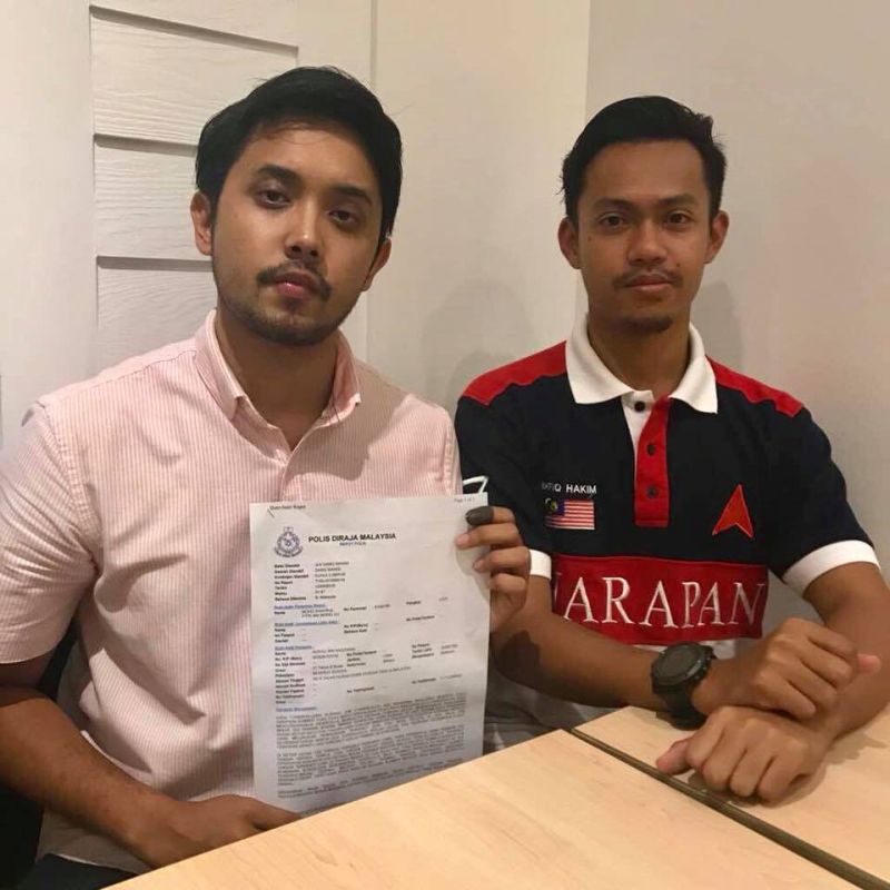 PPBM Youth executive committee member Ben Ali (left) shows the police report lodged after he received the information on the Birkin handbags belonging to Datin Seri Rosmah Mansor. u00e2u20acu2022 Picture via Facebook/Ben Ali