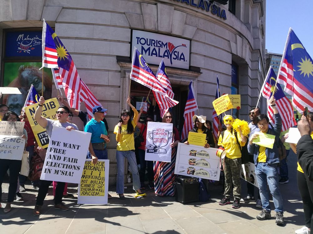 Malaysian voters in the UK staged a protest against the Election Commission in front of the Malaysian Tourism Promotion Board office near Trafalgar square on May 7, 2018. u00e2u20acu201d Picture courtesy of Melissa Sasidaran/Facebook
