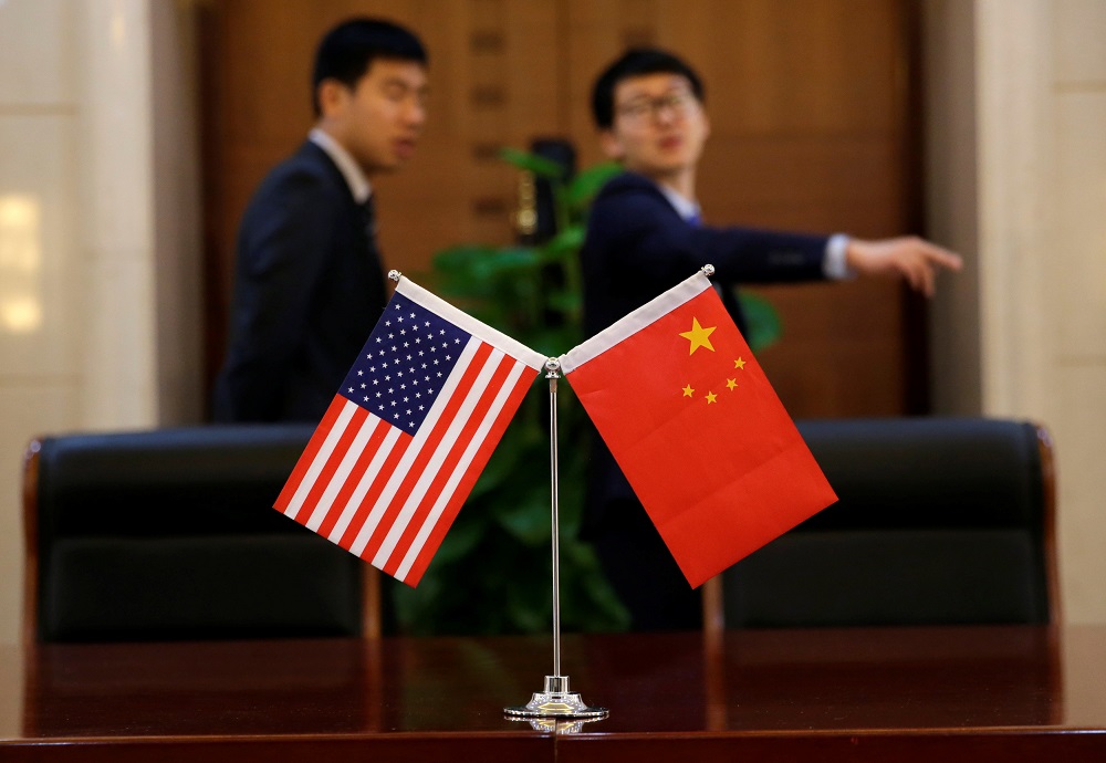 Chinese and US flags are set up for a signing ceremony during a visit by US Secretary of Transportation Elaine Chao at China's Ministry of Transport in Beijing, April 27, 2018. u00e2u20acu201d Reuters pic