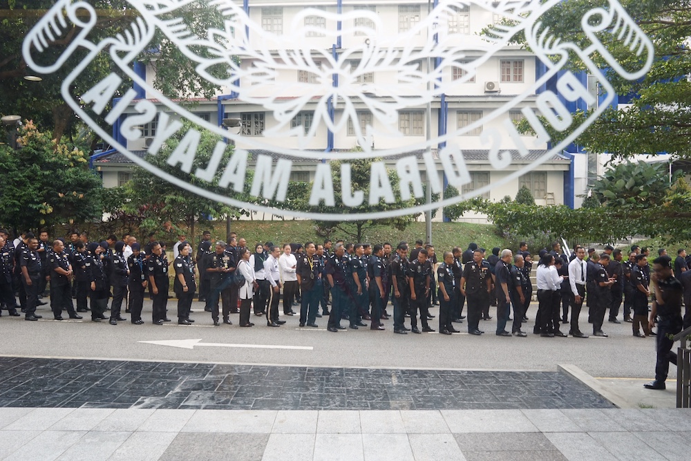 Police officers queue to cast their ballot as early voters in Bukit Aman, Kuala Lumpur May 5, 2018. u00e2u20acu201d Picture by Ahmad Zamzahuri