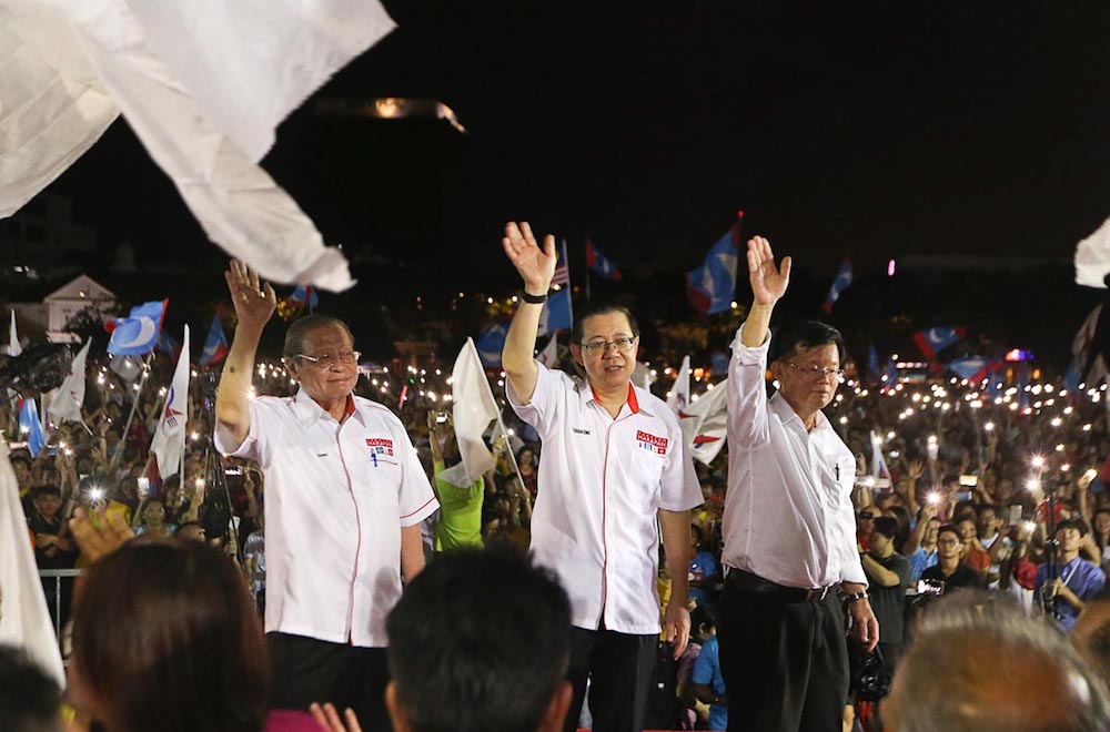 Lim Kit Siang, Lim Guan Eng and Chow Kon Yeow wave during the Pakatan Harapan Ceramah Mega at Esplanade in George Town May 14, 2018. u00e2u20acu201d Picture by Sayuti Zainudin
