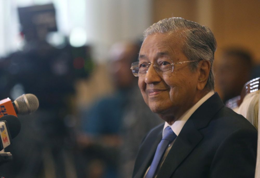 Tun Dr Mahathir Mohamad speaks during a press conference in Putrajaya May 16, 2018. u00e2u20acu2022 Picture by Razak Ghazali