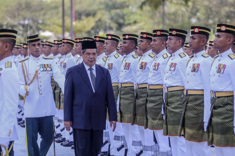 Mohamad Sabu inspects a ceremonial Guard of Honour on his first day at work as Defence Minister in Mindef, Kuala Lumpur May 22, 2018. u00e2u20acu2022 Picture by FIrdaus Latif