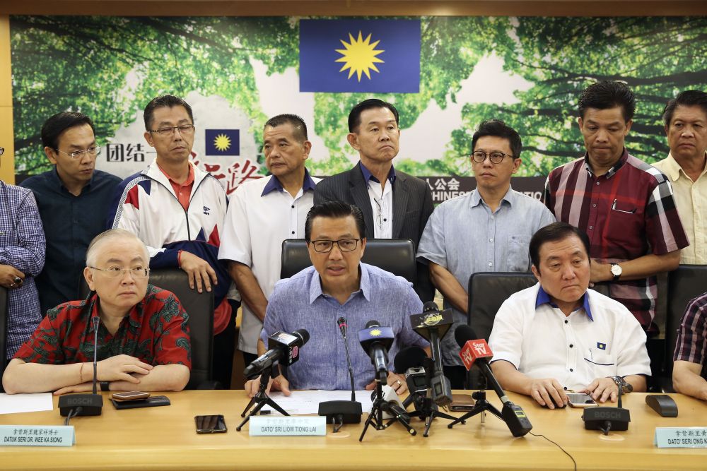 MCA President Datuk Seri Liow Tiong Lai (centre) speaks during a press conference at its headquarters in Kuala Lumpur May 11, 2018. u00e2u20acu2022 Picture by Yusof Mat Isa