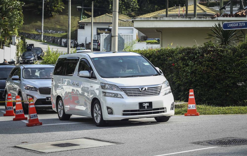 A white Toyota Vellfire believed to be ferrying Datuk Seri Najib Razak is seen leaving his residence in Kuala Lumpur May 28, 2018. u00e2u20acu2022 Picture by Firdaus Latif