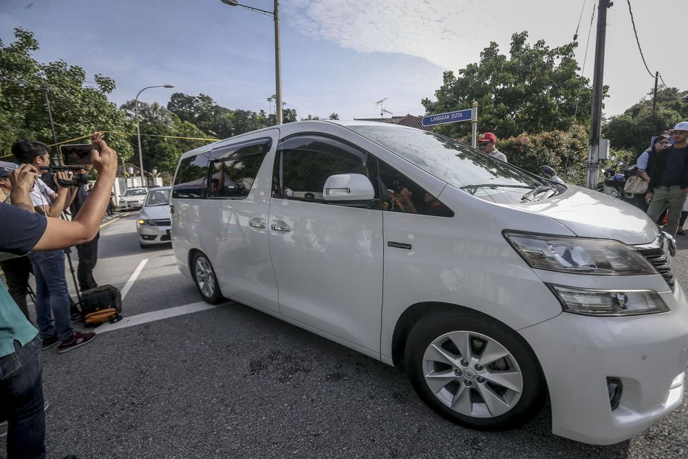 A Toyota Estima was part of a five-vehicle convoy, said to include Najibu00e2u20acu2122s lawyer and aides, escorted out by two police outriders at 9.20am. u00e2u20acu2022 Picture by Hari Anggara