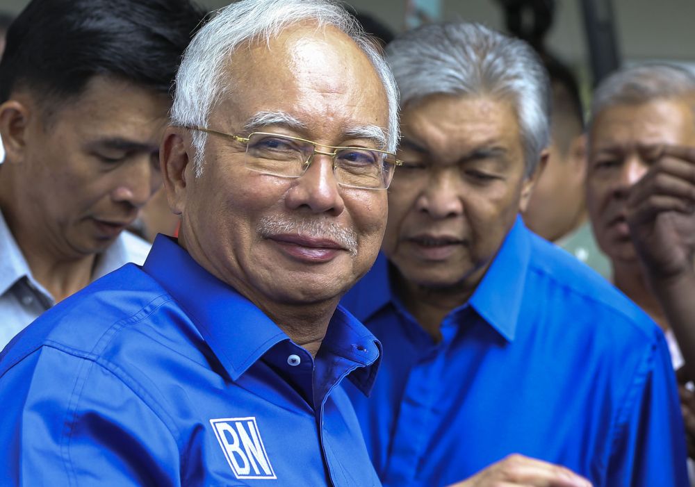 Datuk Seri Najib Razak and Datuk Seri Ahmad Zahid Hamidi leave after giving a press conference at PWTC in Kuala Lumpur May 10, 2018. u00e2u20acu2022 Picture  by Azneal Ishak