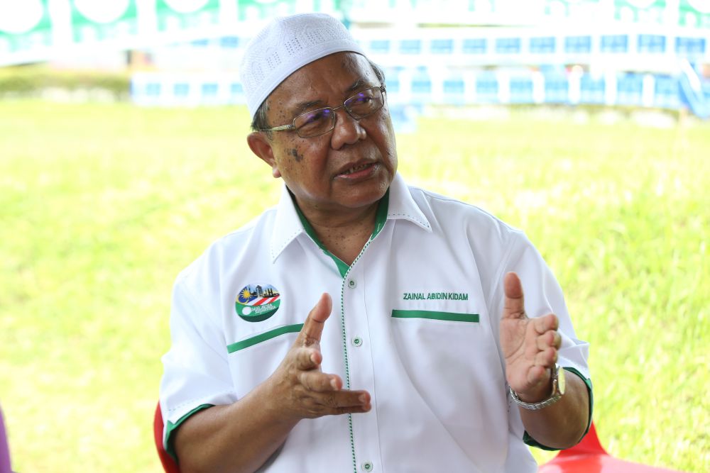 PASu00e2u20acu2122 Putrajaya candidate Prof Zainal Abidin Kidam speaks during the campaign in Putrajaya today, May 5, 2018. u00e2u20acu2022 Picture by Azinuddin Ghazali