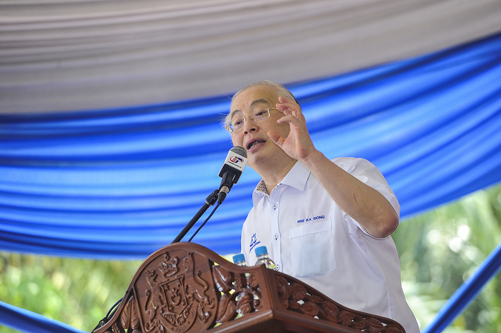 Datuk Seri Wee Ka Siong speaks during ground-breaking for affordable houses in Yong Peng May 7, 2018. u00e2u20acu201d Picture by Shafwan Zaidon