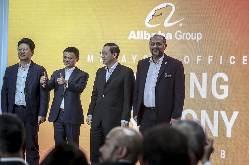 Alibaba's Jack Ma (second left), Finance Minister Lim Guan Eng and Communications and Multimedia Minister Gobind Singh Deo at the opening of the groupu00e2u20acu2122s first Southeast Asian office in Kuala Lumpur June 18, 2018. u00e2u20acu201d Picture by Hari Anggara