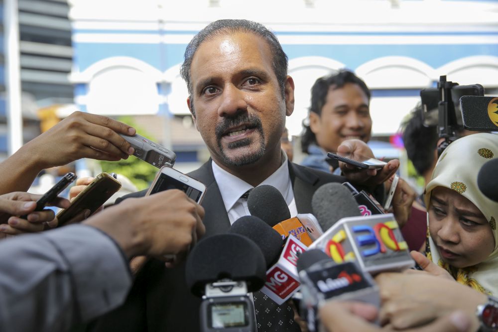 Ramkarpal Singh speaks to reporters outside the Dang Wangi police station in Kuala Lumpur on June 20, 2018. u00e2u20acu201d Picture by Yusof Mat Isa