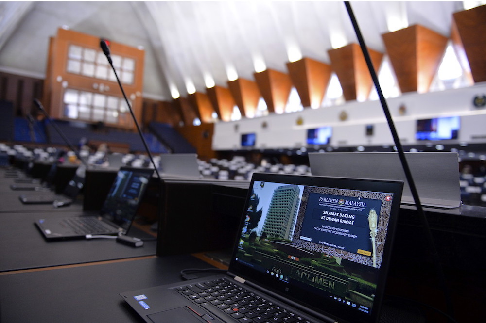 Laptops are seen ready for use in Dewan Rakyat ahead of the 14th Parliament session that begins July 16. u00e2u20acu201d Bernama pic