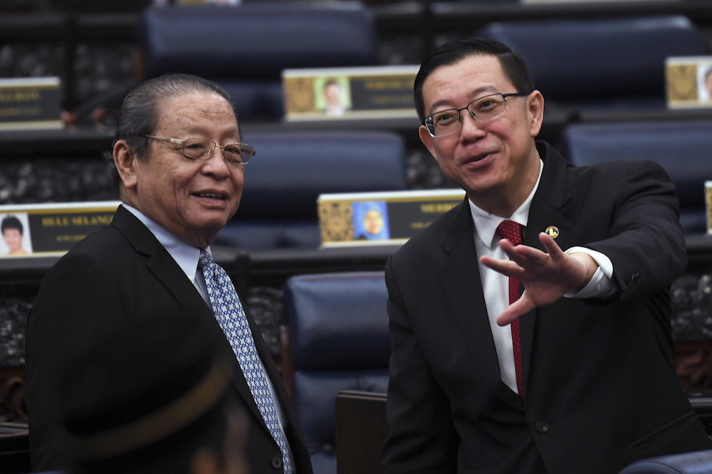 Minister of Finance Lim Guan Eng seen here with Iskandar Puteri MP Lim Kit Siang at the 14th Parliament sitting, July 16, 2018. u00e2u20acu201d Bernama pic