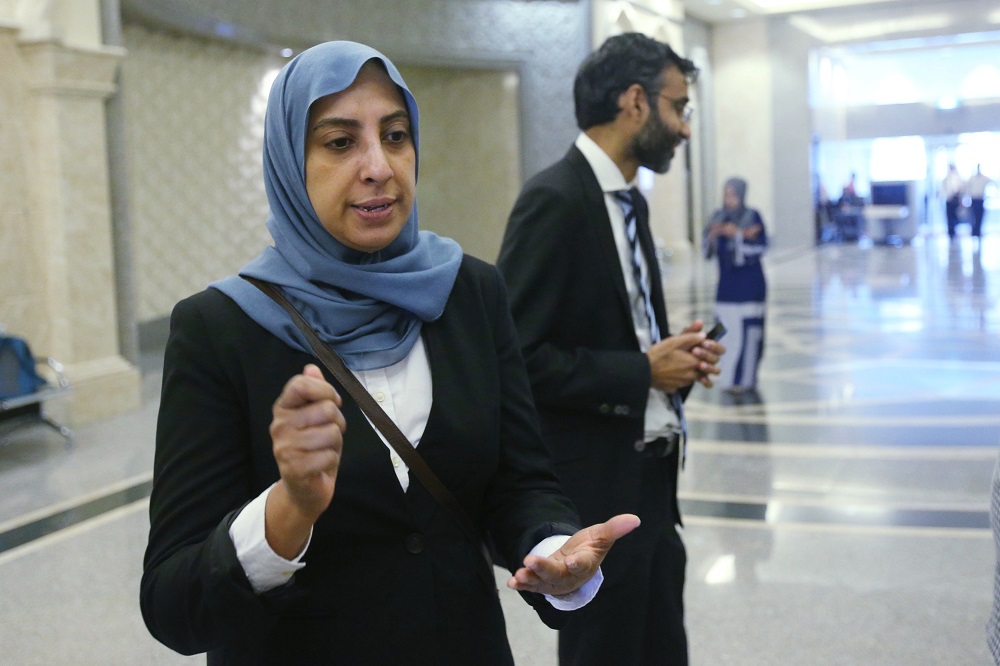 Lawyer Latheefa Koya (left), who is representing lawyer N. Surendran (right) in his constitutional challenge against the Sedition Act, speaks to reporters in Putrajaya July 13, 2018. u00e2u20acu201d  Picture by Azinuddin Ghazali