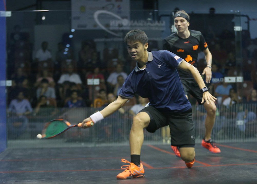 Malaysiau00e2u20acu2122s Ng Eain Yow competes against Franceu00e2u20acu2122s Lucas Serme during the menu00e2u20acu2122s quarter-final at the Malaysian Open Squash Championships 2018 in Kuala Lumpur July 20, 2018. u00e2u20acu201d Picture Razak Ghazali