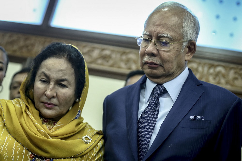 Datuk Seri Najib Razak and his wife, Datin Seri Rosmah Mansor, during a birthday celebration at the Parliament lobby in Kuala Lumpur July 23, 2018. u00e2u20acu201d Picture by Hari Anggara