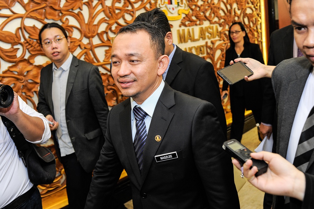 Education Minister Maszlee Malik arrives in Parliament July 26, 2018. u00e2u20acu201d Picture by Shafwan Zaidon