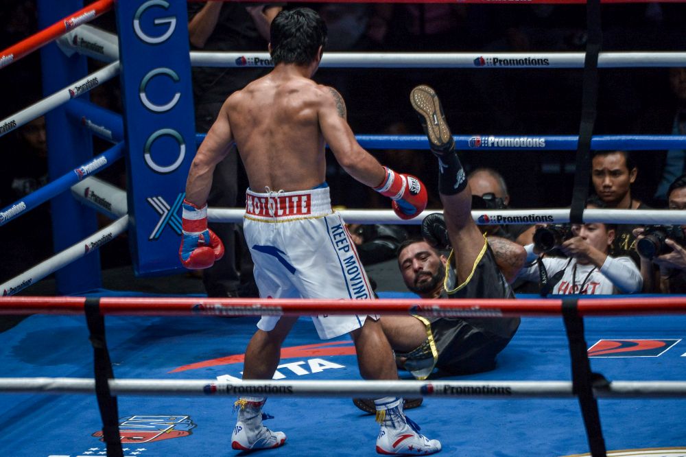 帕奎奥在第7圈技术性击倒（TKO）阿根廷拳王马特西获胜。-Mukhriz Hazim摄-