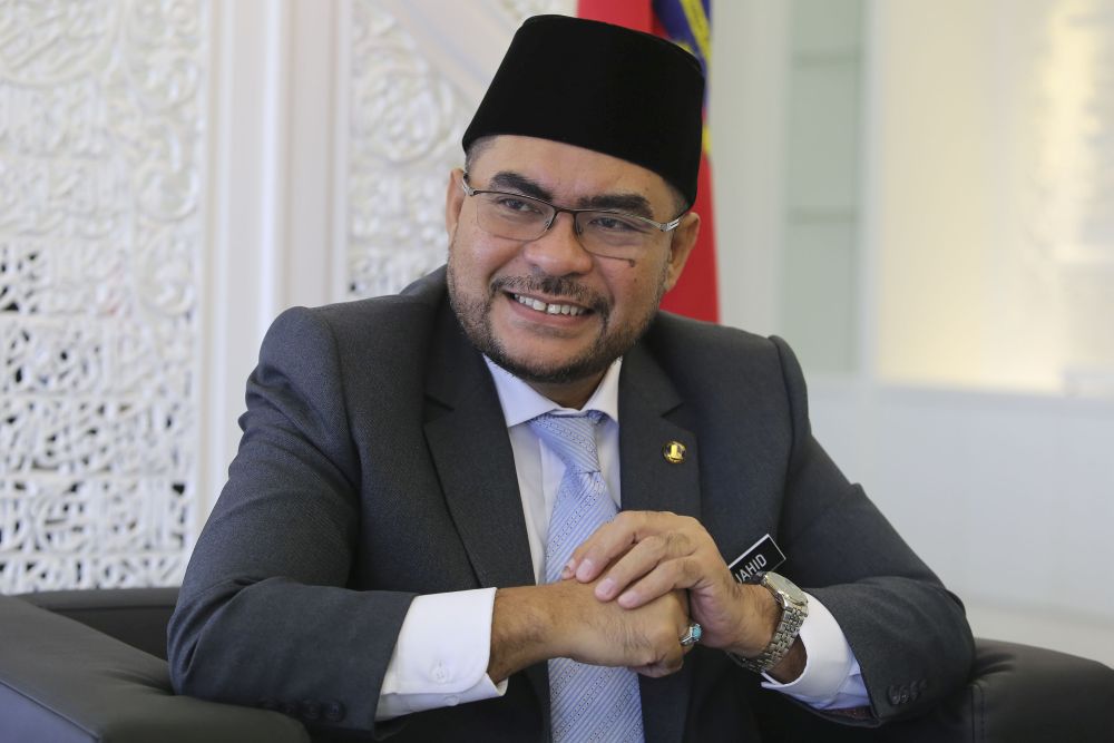 Minister in the Prime Minister's Department, Datuk Mujahid Yusof Rawa speaks to Malay Mail during an interview at his office in Putrajaya July 05, 2018. u00e2u20acu201d Picture by Yusof Mat Isa