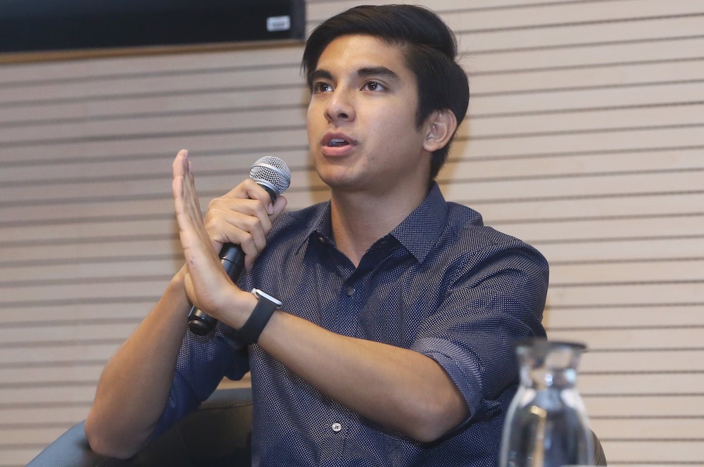 Youth and Sports Minister Syed Saddiq Abdul Rahman attends a forum at Sunway University in Petaling Jaya July 9, 2018. u00e2u20acu201d Picture by Zuraneeza Zulkifli