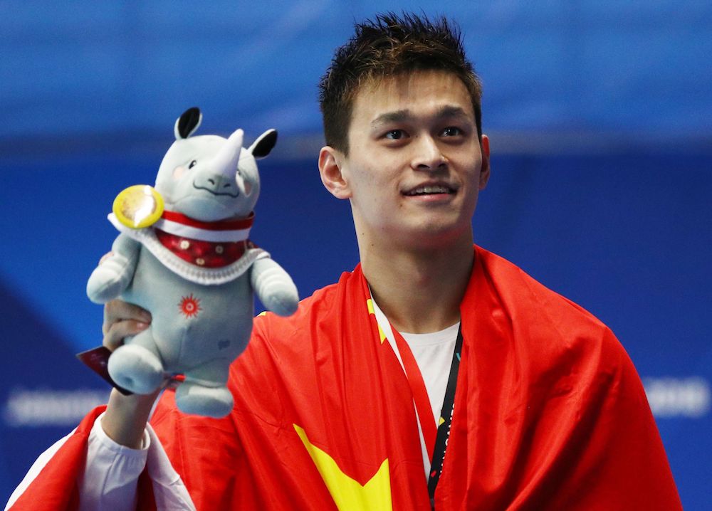 Gold medallist Sun Yang of China celebrates during the Menu00e2u20acu2122s 400m Freestyle Medal Ceremony at the 2018 Asian Games in Jakarta August 21, 2018. u00e2u20acu201d Reuters pic