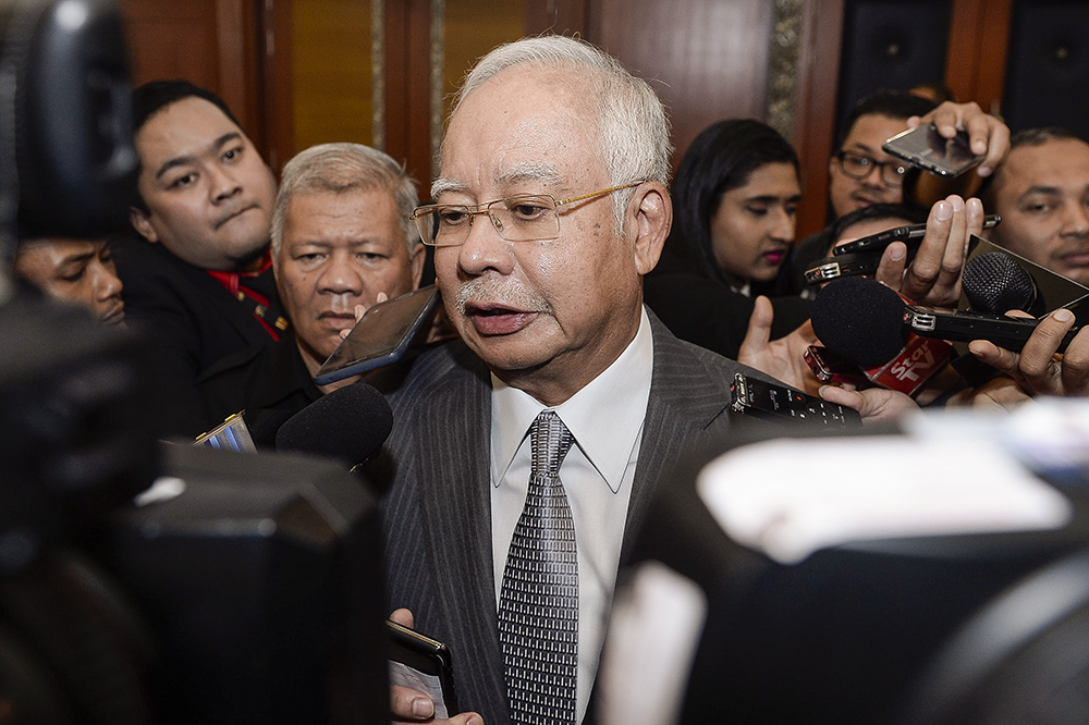 Datuk Seri Najib Razak speaks to reporters at the Parliament in Kuala Lumpur August 13, 2018. u00e2u20acu201d Picture by Miera Zulyana