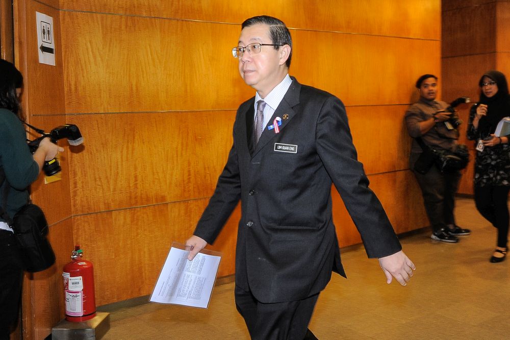 Finance Minister Lim Guan Eng arrives for the Sale & Service Tax media briefing at the Ministry of Finance August 30, 2018. u00e2u20acu201d Picture by Shafwan Zaidon