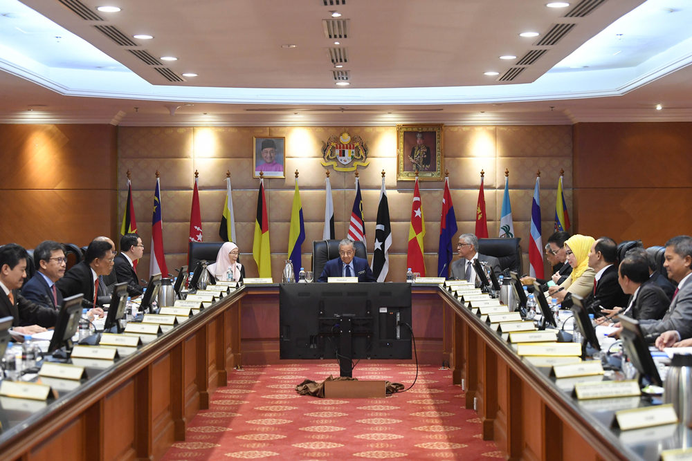 Prime Minister Tun Mahathir (centre)  and Deputy Prime Minister Datuk Seri Wan Azilah Wan Ismail ((left) at a special cabinet meeting in Putrajaya August 13, 2108. u00e2u20acu201d Picture by Azinuddin Ghazali.