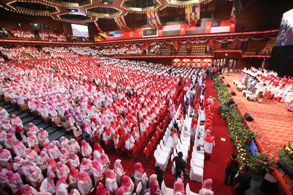 Delegates attend the Umno General Assembly 2018 at Putra World Trade Centre in Kuala Lumpur September 28, 2018. u00e2u20acu201d Picture by Azinuddin Ghazali