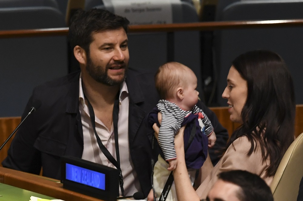 Jacinda Ardern, Prime Minister and Minister for Arts, Culture and Heritage, and National Security and Intelligence of New Zealand holds her daughter Neve Te Aroha Ardern Gayford, as her husband Clarke Gayford looks on, September 24, 2018. u00e2u20acu201d AFP pic