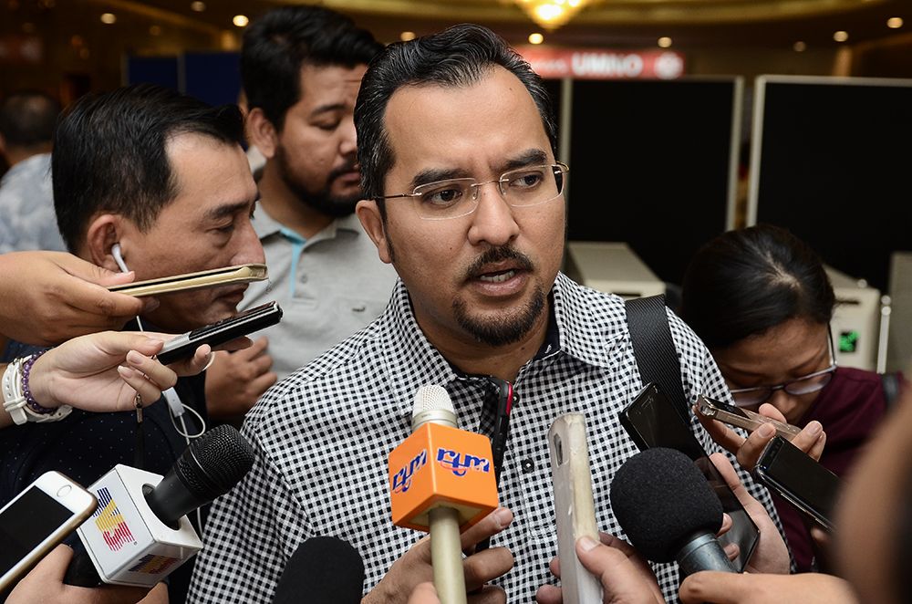 Umno Youth chief Asyraf Wajdi Dusuki speaking to reporters at PWTC on September 23, 2018. u00e2u20acu201d Picture by Miera Zulyana