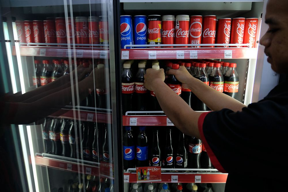 How does Malaysia compare against its neighbours when it comes to the idea of taxing soda? u00e2u20acu2022 Bernama pic