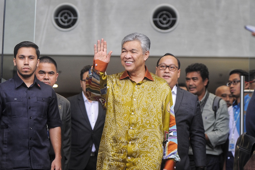 Umno President Datuk Seri Ahmad Zahid Hamidi leaves MACC headquarters in Putrajaya October 10, 2018. u00e2u20acu201d Picture by Shafwan Zaidon