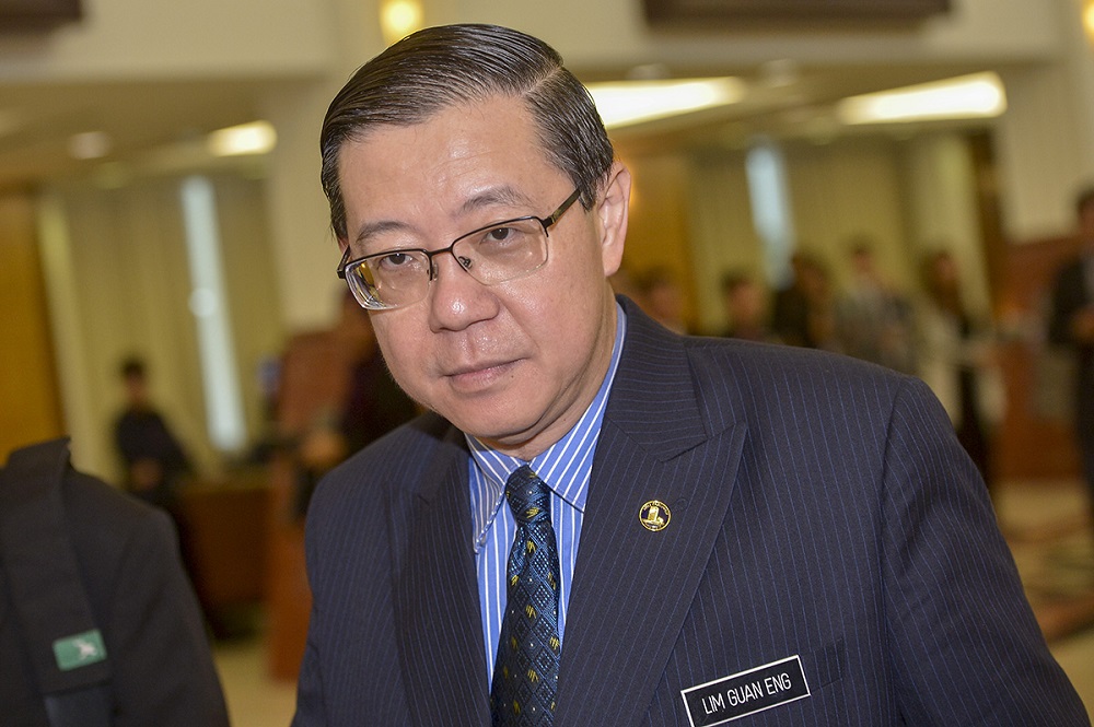Finance Minister Lim Guan Eng arrives at the Parliament in Kuala Lumpur October 17, 2018. u00e2u20acu201d Picture by Mukhriz Hazim