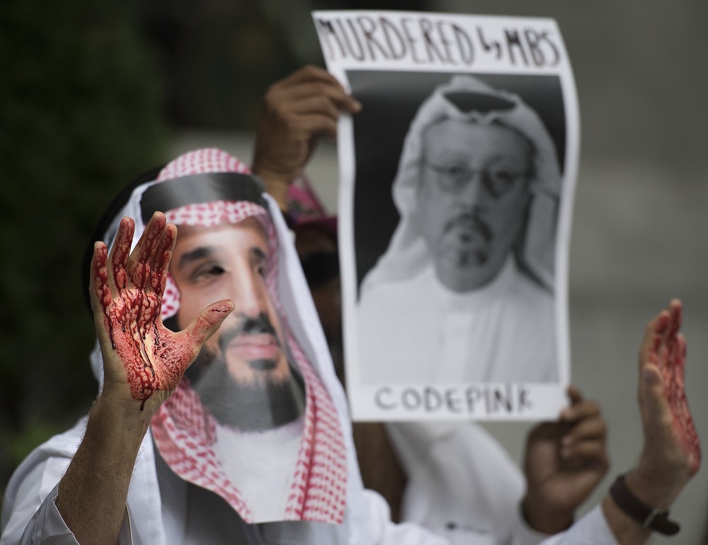 A demonstrator dressed as Saudi Arabian Crown Prince Mohammed Salman with blood on his hands protests with others outside the Saudi Embassy in Washington, DC, on October 8, 2018. u00e2u20acu201d AFP pic