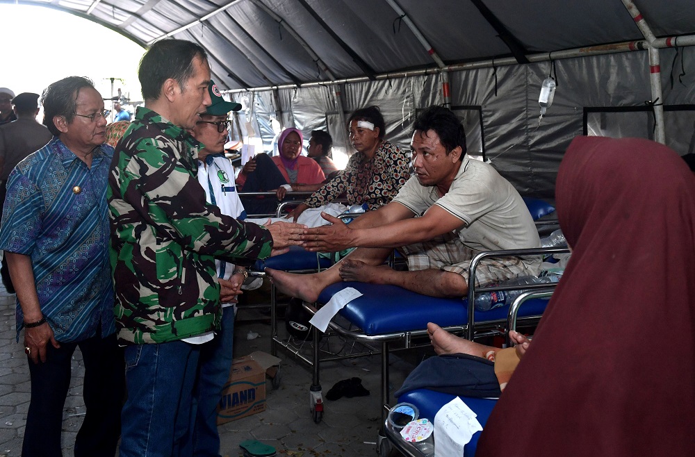 Indonesian President Joko Widodo, accompanied by Central Sulawesi Governor Longki Djanggola, visits people injured by the earthquake and tsunami in Palu, Sulawesi, Indonesia September 30, 2018 in this photo taken by Antara Foto. u00e2u20acu201d Reuters pic