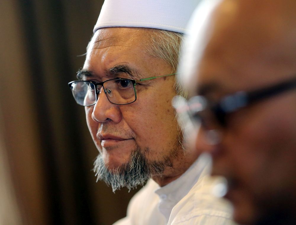 Perak Public Account Committee members Datuk Aznel Ibrahim (right) and Razman Zakaria speak at a press conference in Hotel Impiana, Ipoh November 19, 2018. u00e2u20acu201d Picture by Farhan Najib